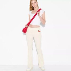 🌸3/$30 NWT  Hello Kitty Sanrio Cream Flare Leg Pants with Red Bow Accent- XXL